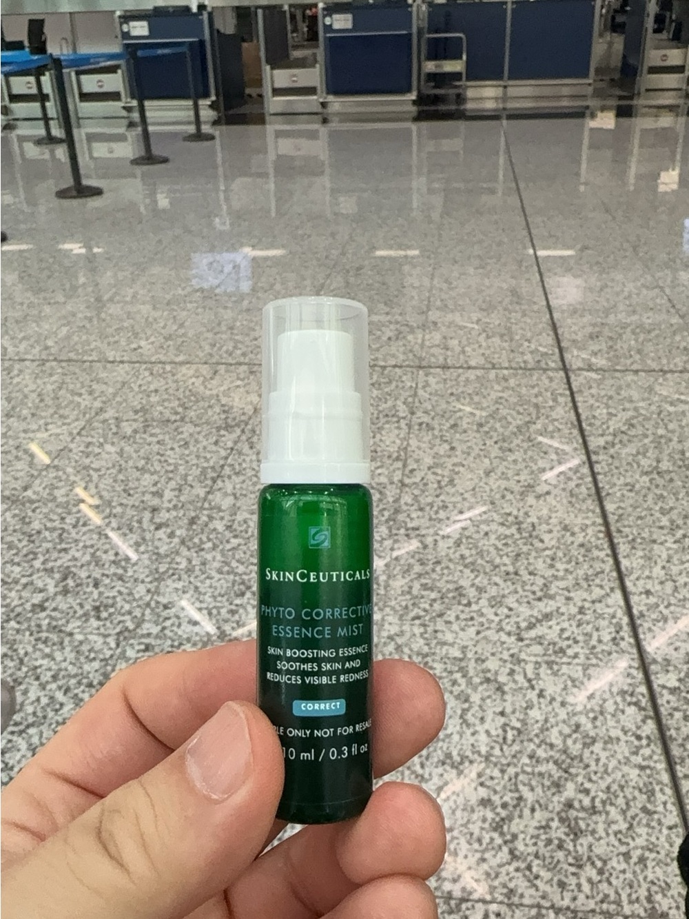 SkinCeuticals Phyto Corrective Essence Mist — dark green & white bottle